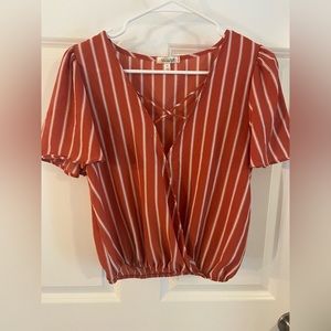 Medium orange and white shirt